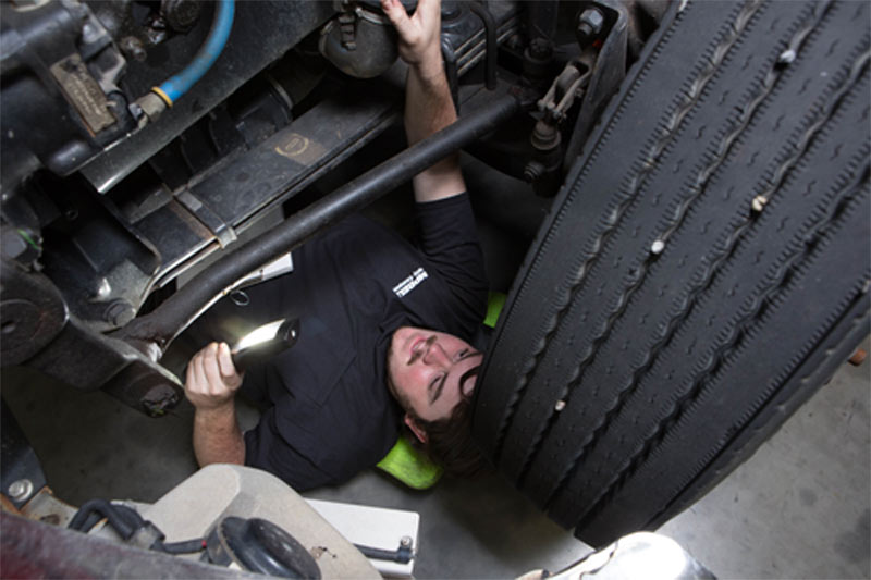mechanic-under-truck